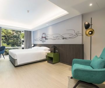 A room with one bed at Maitria Hotel Rama 9 Bangkok