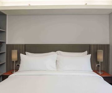 A Suite with one bed at Maitria Hotels & Residences