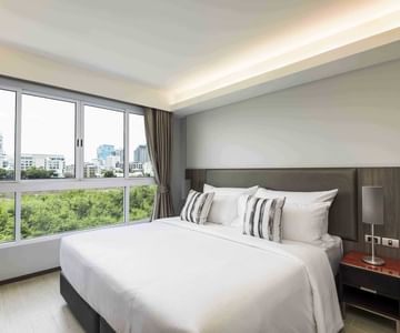 A room with one bed at Maitria Hotels & Residences